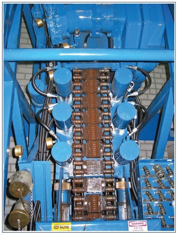 Injector Head Drive Assembly close up, showing drive chains