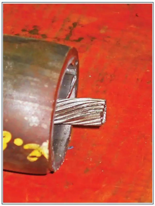 Example of Coiled Tubing and Electric line after being cut by the Shear Rams