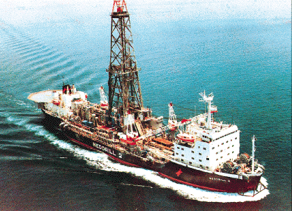Dynamically positioned and anchored drillship